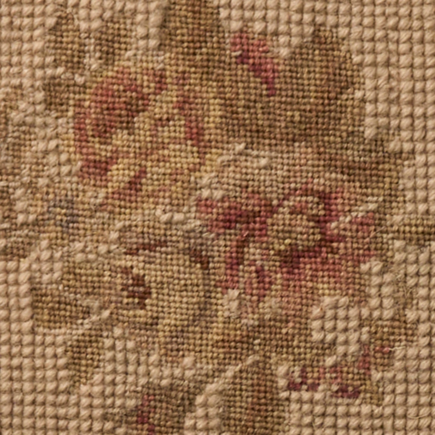 18" x 18" vintage beige rug with a woven floral tapestry pattern in earthy browns, creams, and red accents.