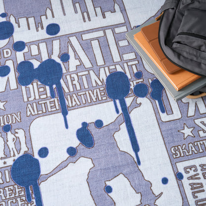 Skate-themed blue and purple rug with skater silhouettes and city skyline; backpack and orange notebook rest on corner.