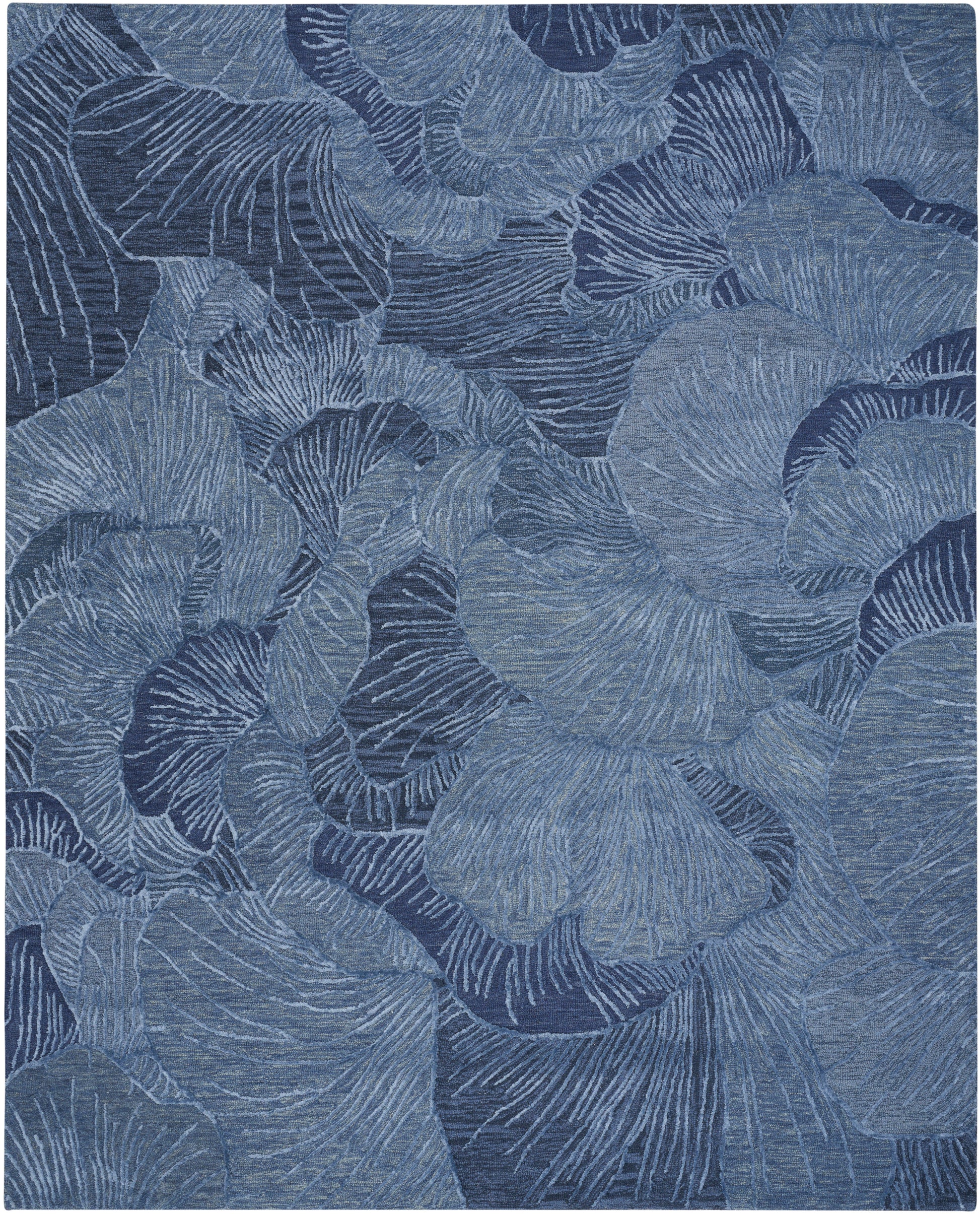 Blue abstract leaf pattern with overlapping ginkgo-like leaves & a textured, fabric-like appearance.