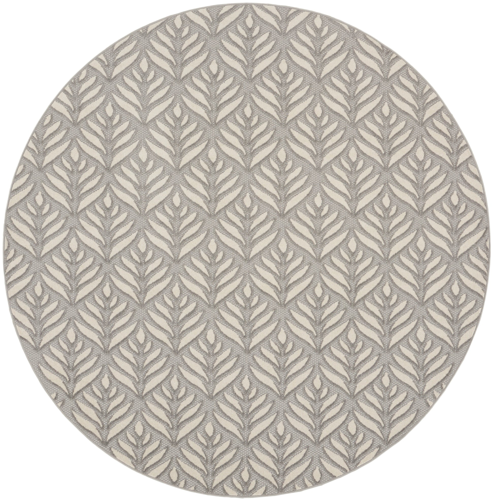 Round rug with beige base and gray botanical leaf pattern, textured woven surface.