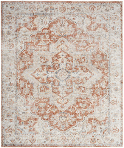 Rectangular distressed oriental rug in rust, ivory and gray with a central medallion and ornate border.