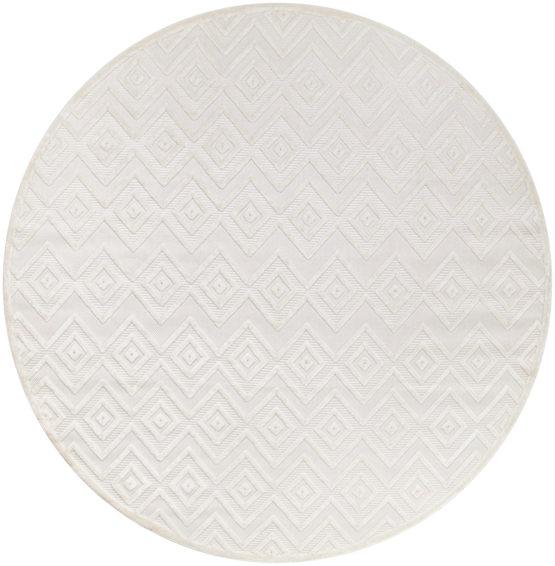 Round cream rug with geometric diamond chevron pattern and subtle woven texture.