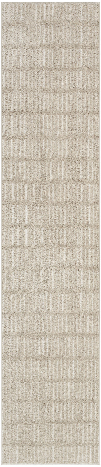 Beige rectangular rug runner with textured vertical stripes and soft shag pile for neutral decor.