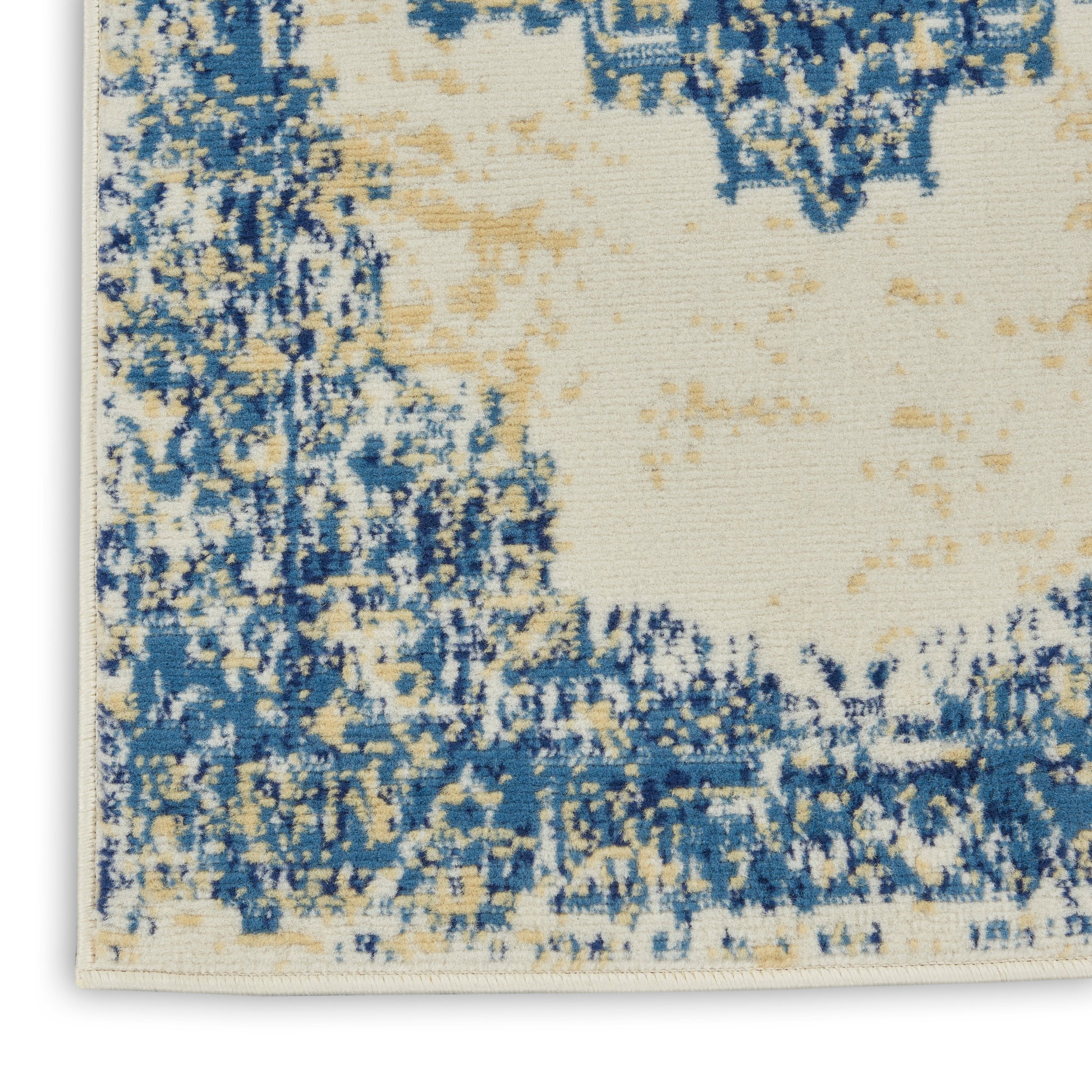 Abstract blue and cream woven runner rug with beige accents and distressed pattern, 12' long.