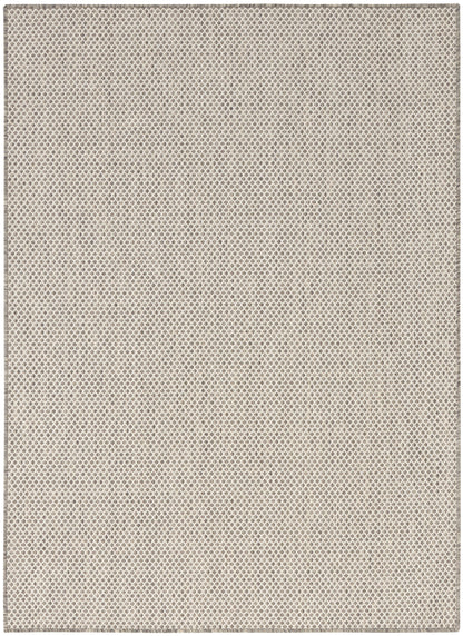 Beige woven area rug with tiny diamond lattice pattern; neutral, versatile home decor.