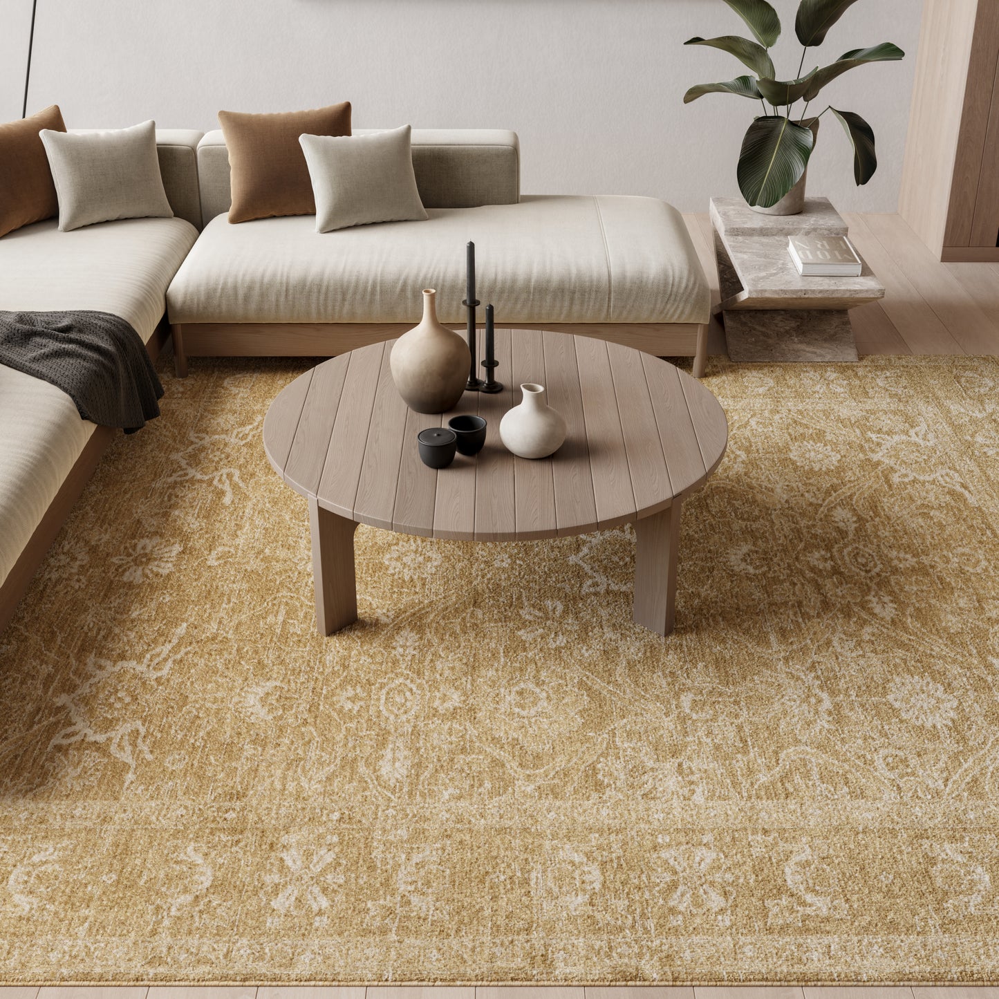 Yellow patterned rug in a beige sectional living room.