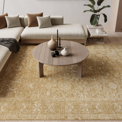 Yellow patterned rug in a beige sectional living room.