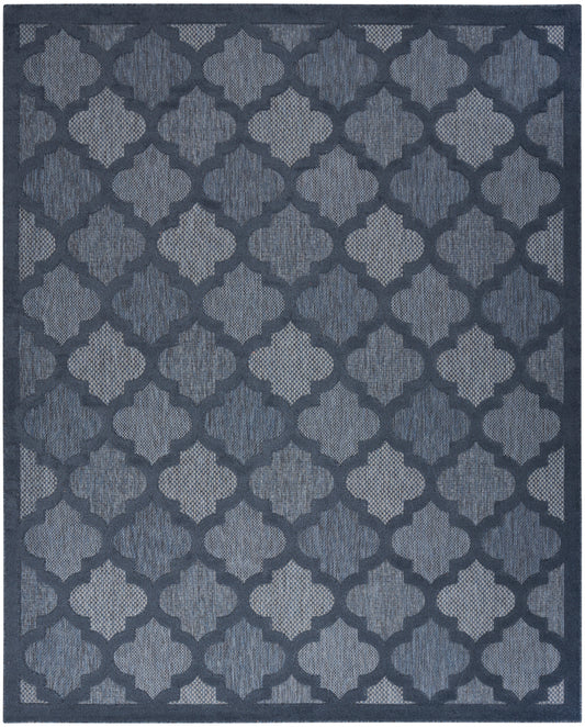 Blue geometric trellis rug with quatrefoil lattice pattern in indigo and denim tones, bordered.