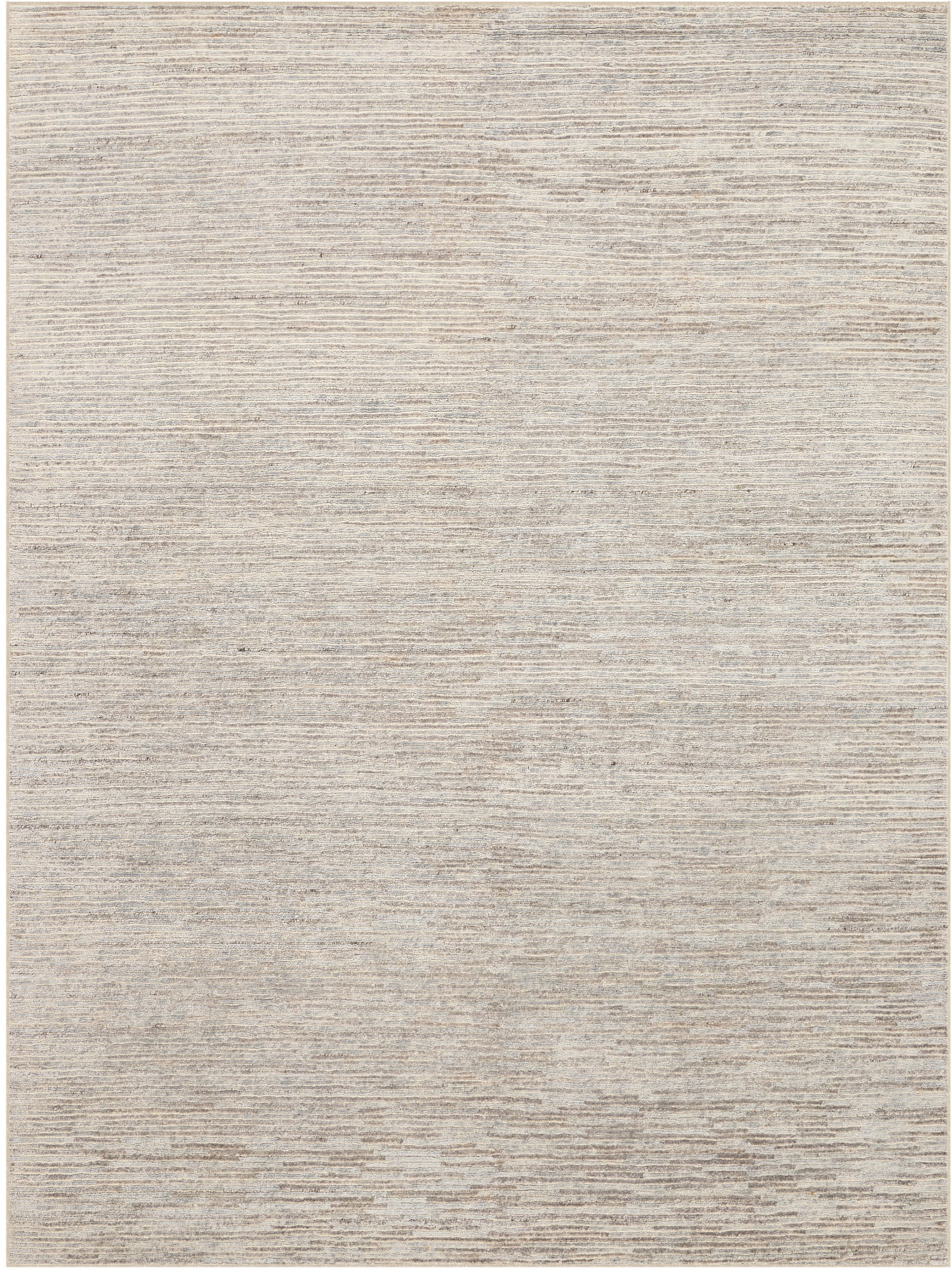 Beige-gray rectangular rug with a soft, textured surface and subtle horizontal banding; a versatile neutral decor piece.