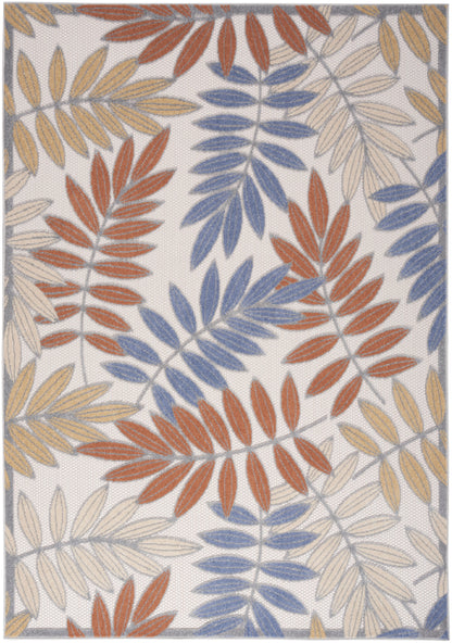 Textured woven rug with cream background and rust, blue, and pale beige leaf clusters; framed border, botanical style.