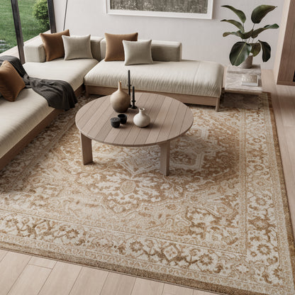 8' x 10' vintage beige patterned rug in a living room with a neutral L-shaped sofa, cushions, plant, and decorative vases.