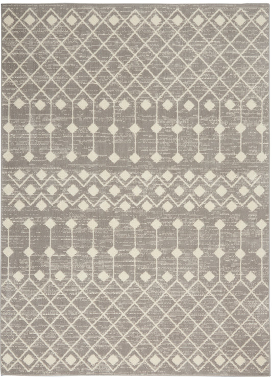 Gray and cream geometric area rug with diamond lattice pattern and woven texture.