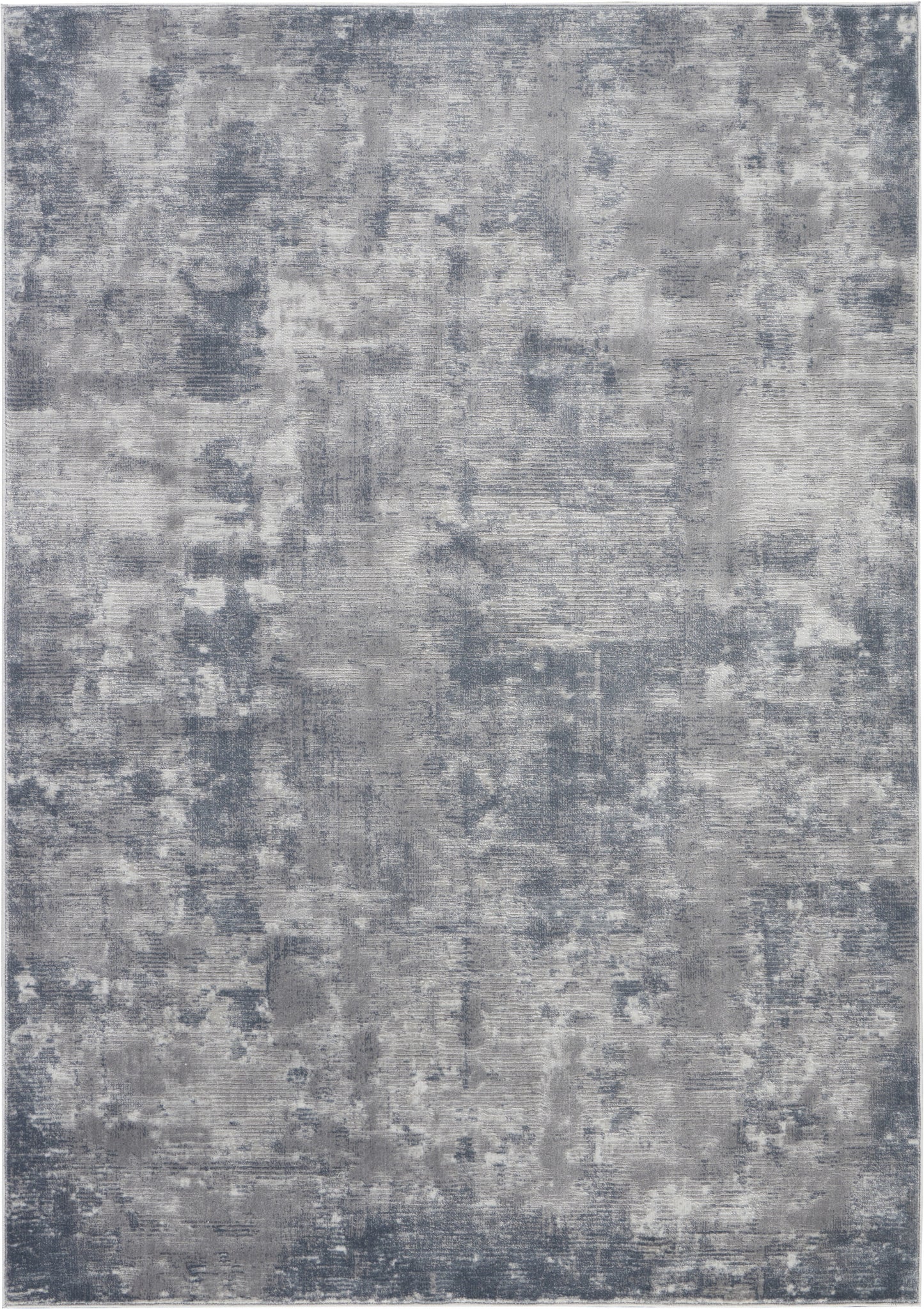 Abstract distressed gray-blue area rug with patchy texture in cool slate tones.
