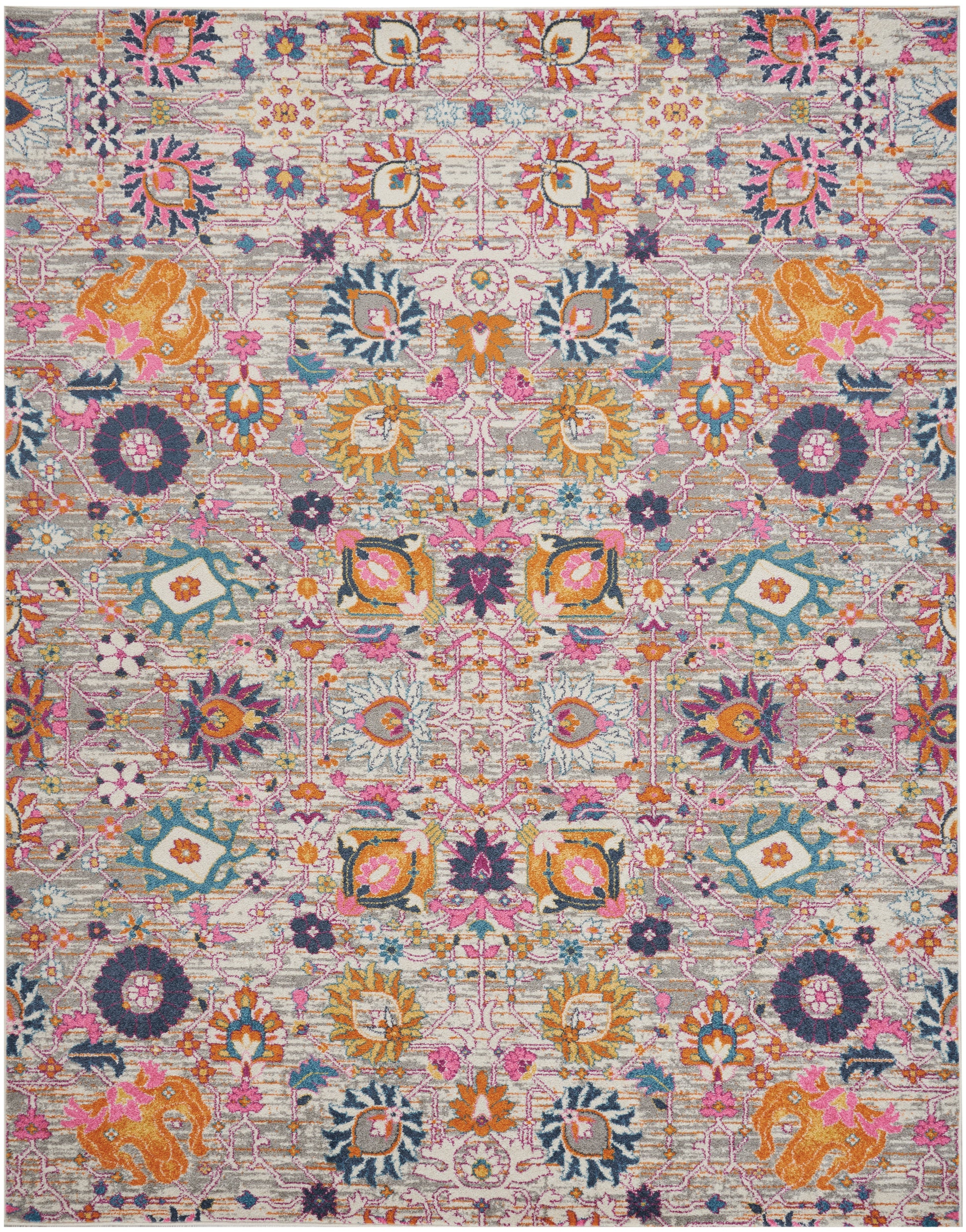 Colorful Bohemian-style rug with pinks, oranges, teals & purples; intricate floral medallion pattern.