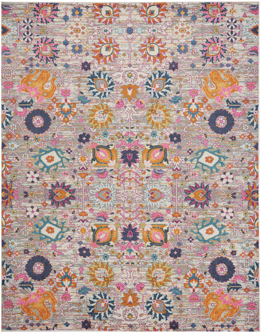 Colorful Bohemian-style rug with pinks, oranges, teals & purples; intricate floral medallion pattern.