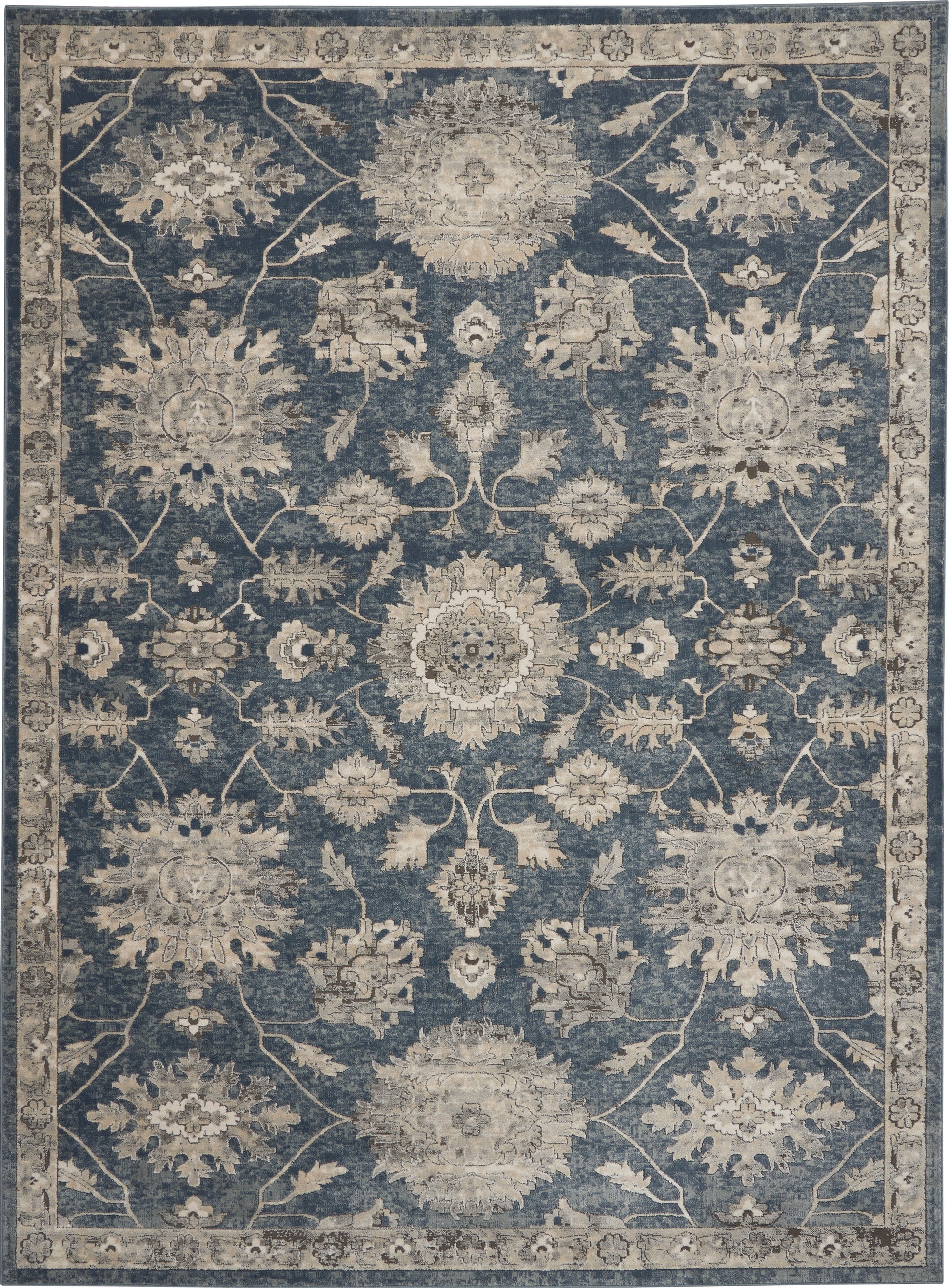 Blue-gray vintage-style rug with cream floral medallions and ornate border; Persian/Oriental design.