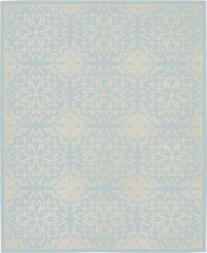 Light blue rug with ivory floral mandala motifs in a repeating border pattern.
