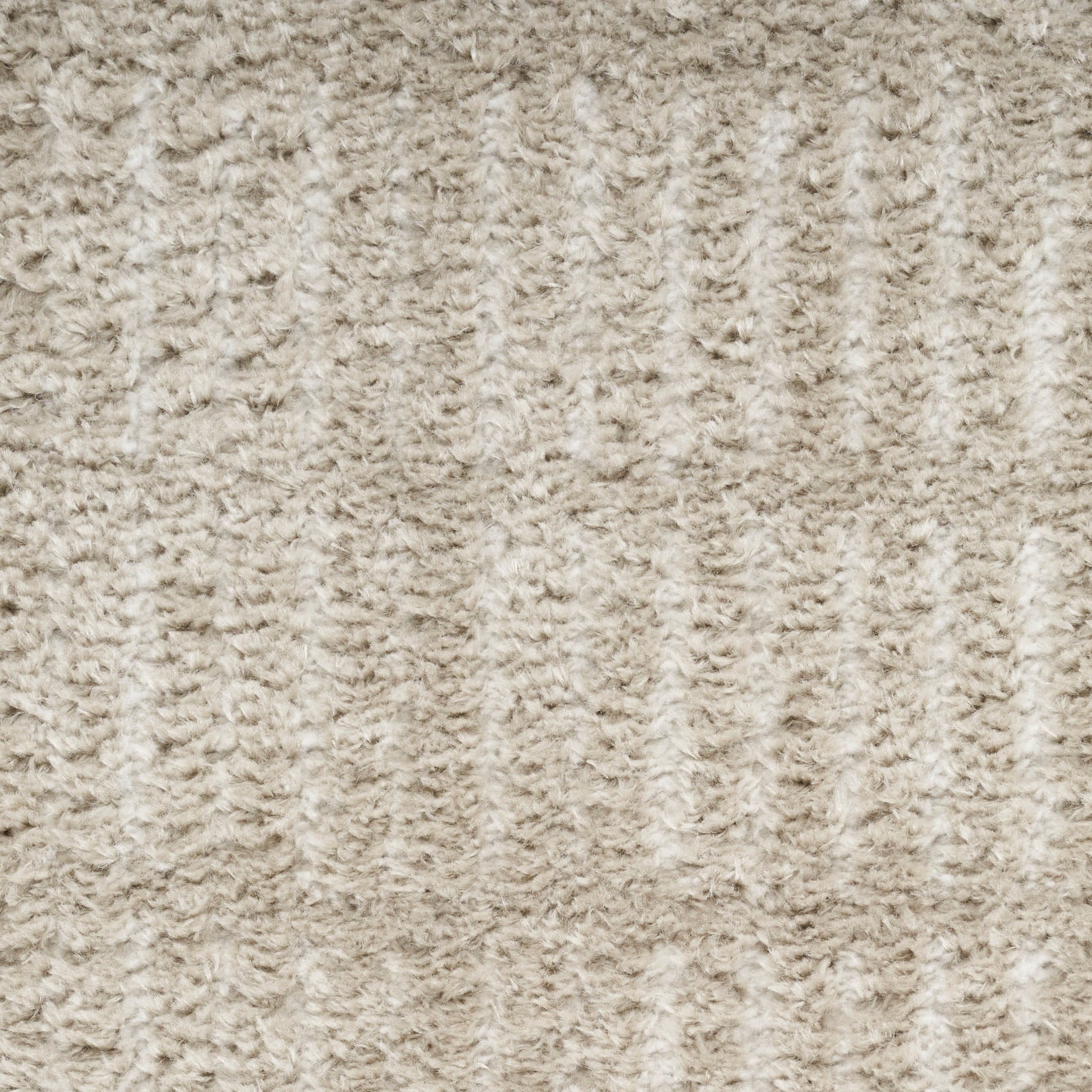 Beige textured carpet with plush looped pile and subtle vertical ribs.