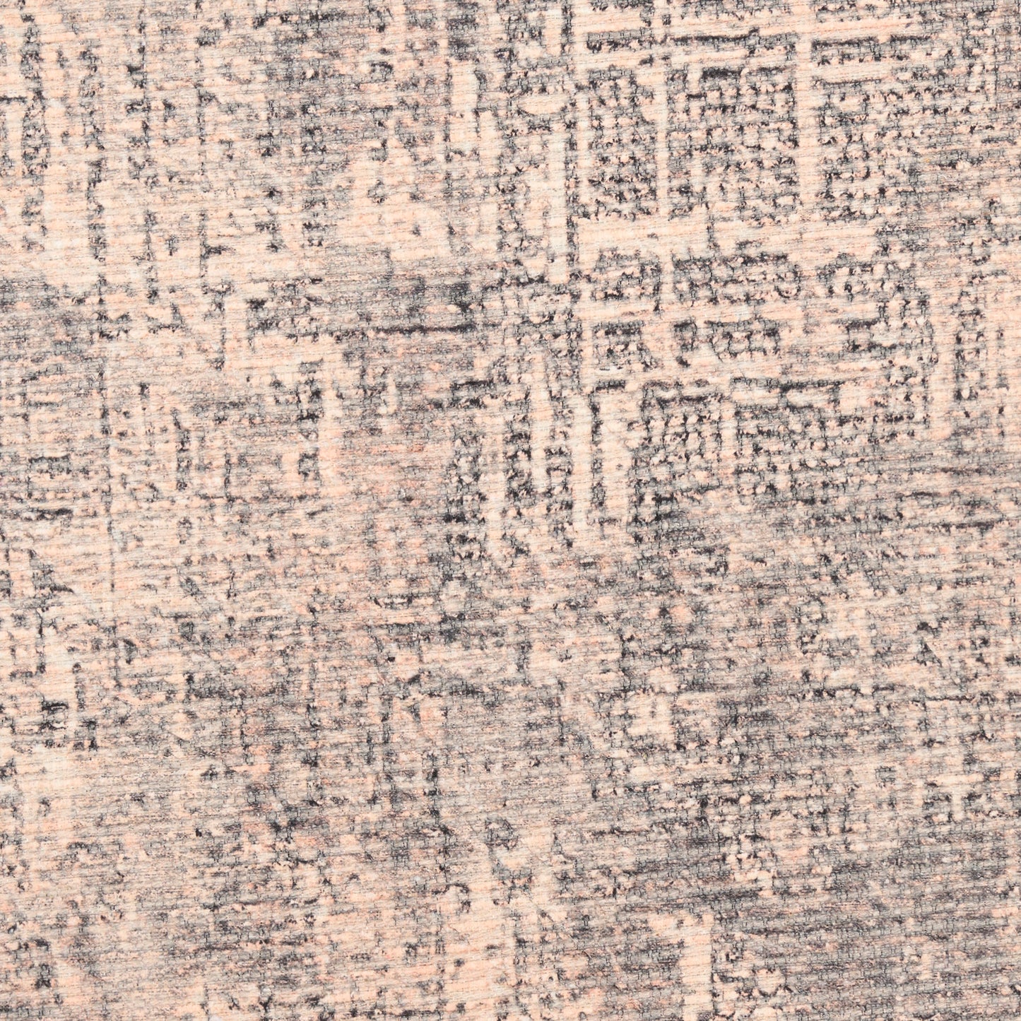 Textured beige and gray abstract geometric area rug with distressed pattern.