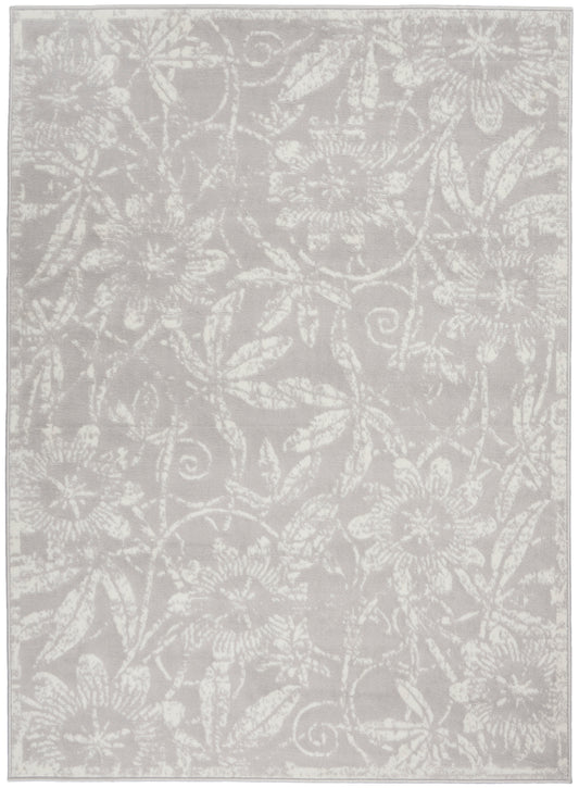 Light gray area rug with white floral damask pattern and a narrow border, decorative living-room rug.