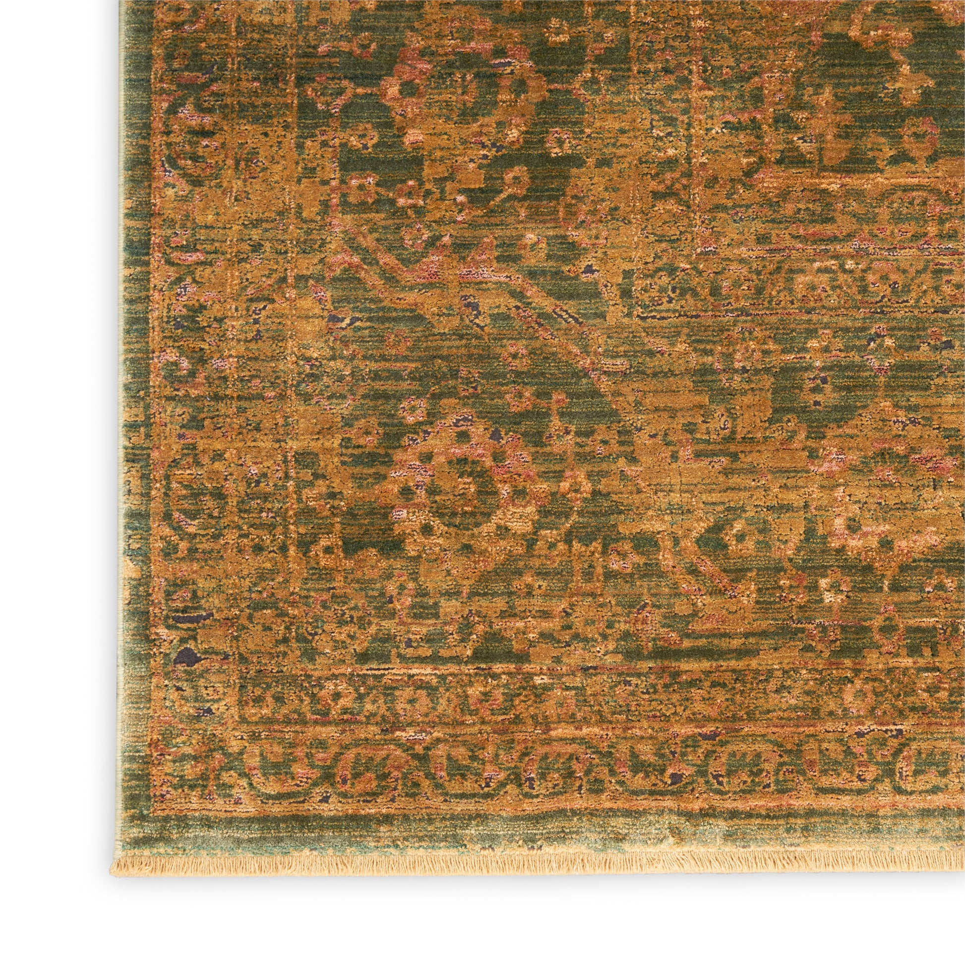 Distressed vintage oriental rug in olive green and burnt orange with pink accents; fringed border.