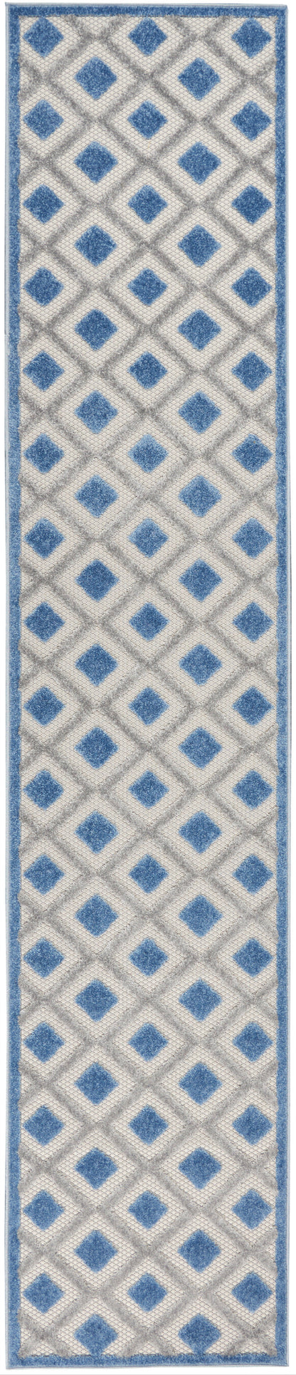 Narrow runner rug with cream background and blue diamond lattice pattern, blue border along edges.