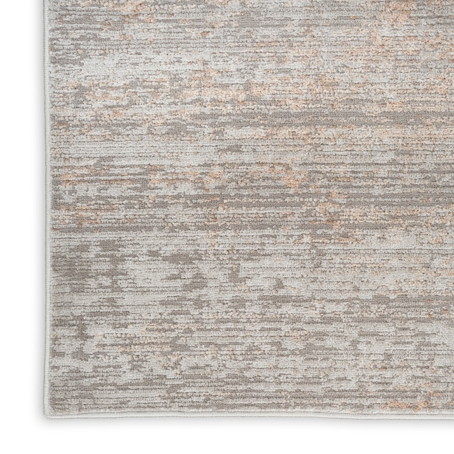 Rectangular area rug with abstract gray and beige pattern, soft textured pile; modern neutral decor for living rooms.
