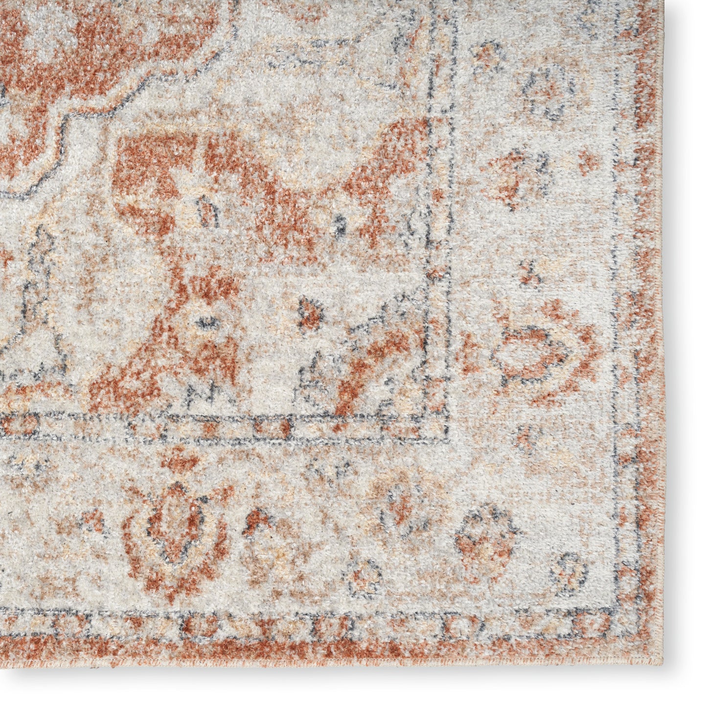 Distressed cream oriental rug with rust and blue-gray motifs, bordered edge, plush pile.