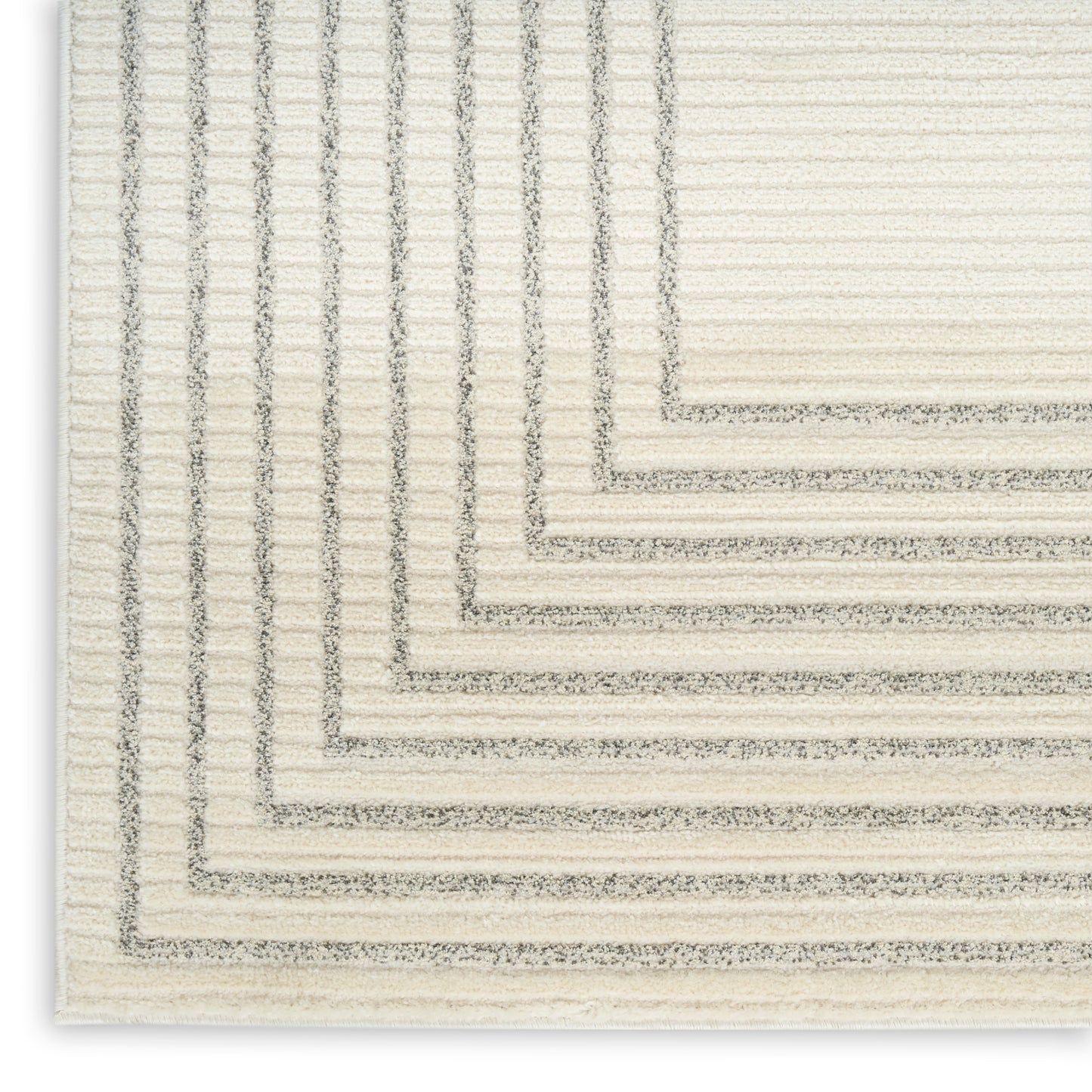 Cream textured area rug with layered grey rectangular border pattern and stepped edges.