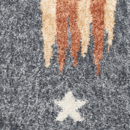 Gray textured rug with cream and brown drip stripes and a white star motif.