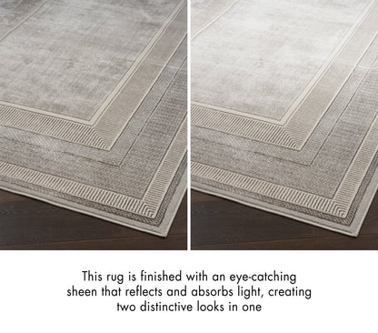 Rectangular gray area rug with layered border pattern, soft low-pile, satin sheen finish for two distinct looks.