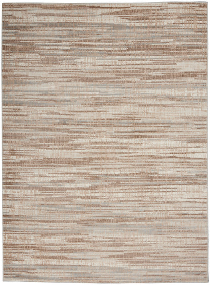 Rectangular beige area rug with subtle tan and ivory horizontal streaks; soft, neutral, modern decor.