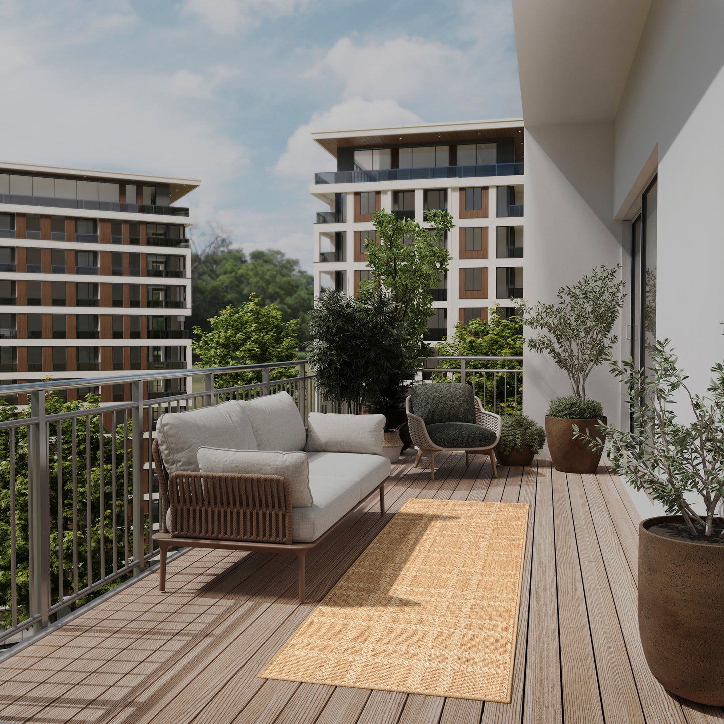 Balcony with beige cushioned wicker sofa, dark round lounge chair, potted plants, beige runner rug, overlooking modern apartments.