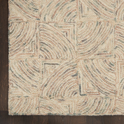 Beige tufted area rug with geometric square blocks and swirling arc patterns in ivory/taupe on dark wood floor.