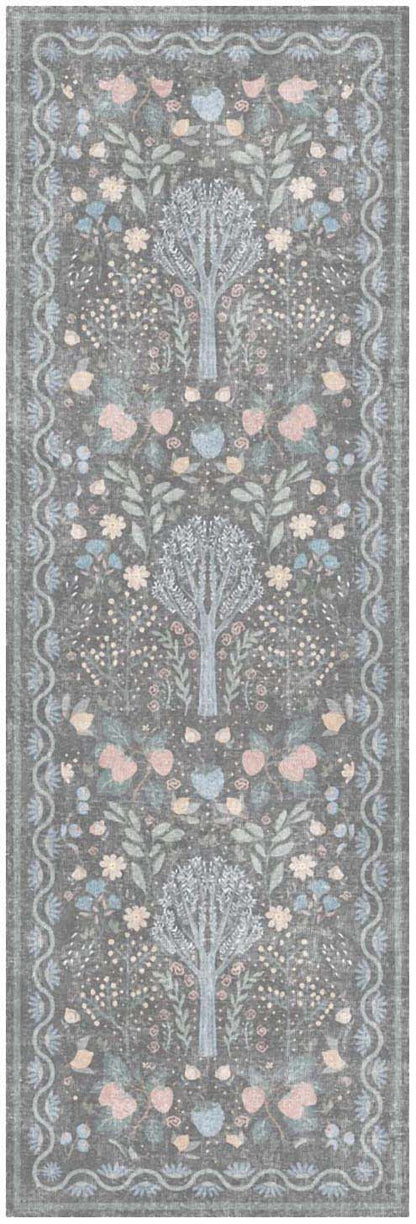 Decorative long textile runner with pale blue tree motifs and peach blossoms on gray-blue background and ornate borders.