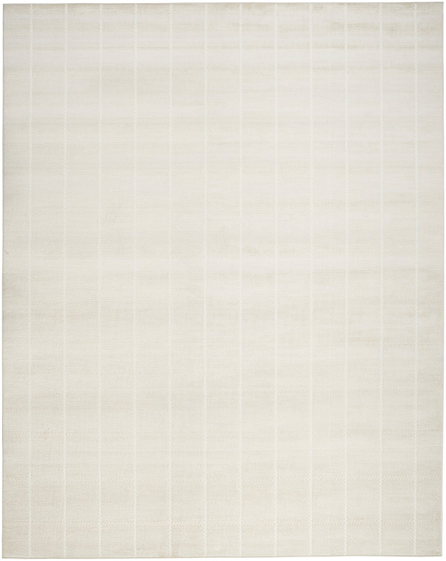 Cream flatwoven rug with subtle vertical gridlines for a minimalist contemporary living room.