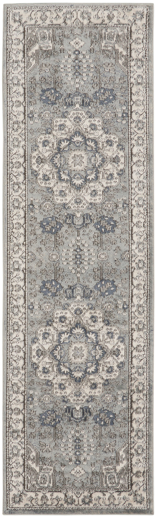 Grey-beige oriental runner rug with blue floral medallions and an ornate border in traditional style.