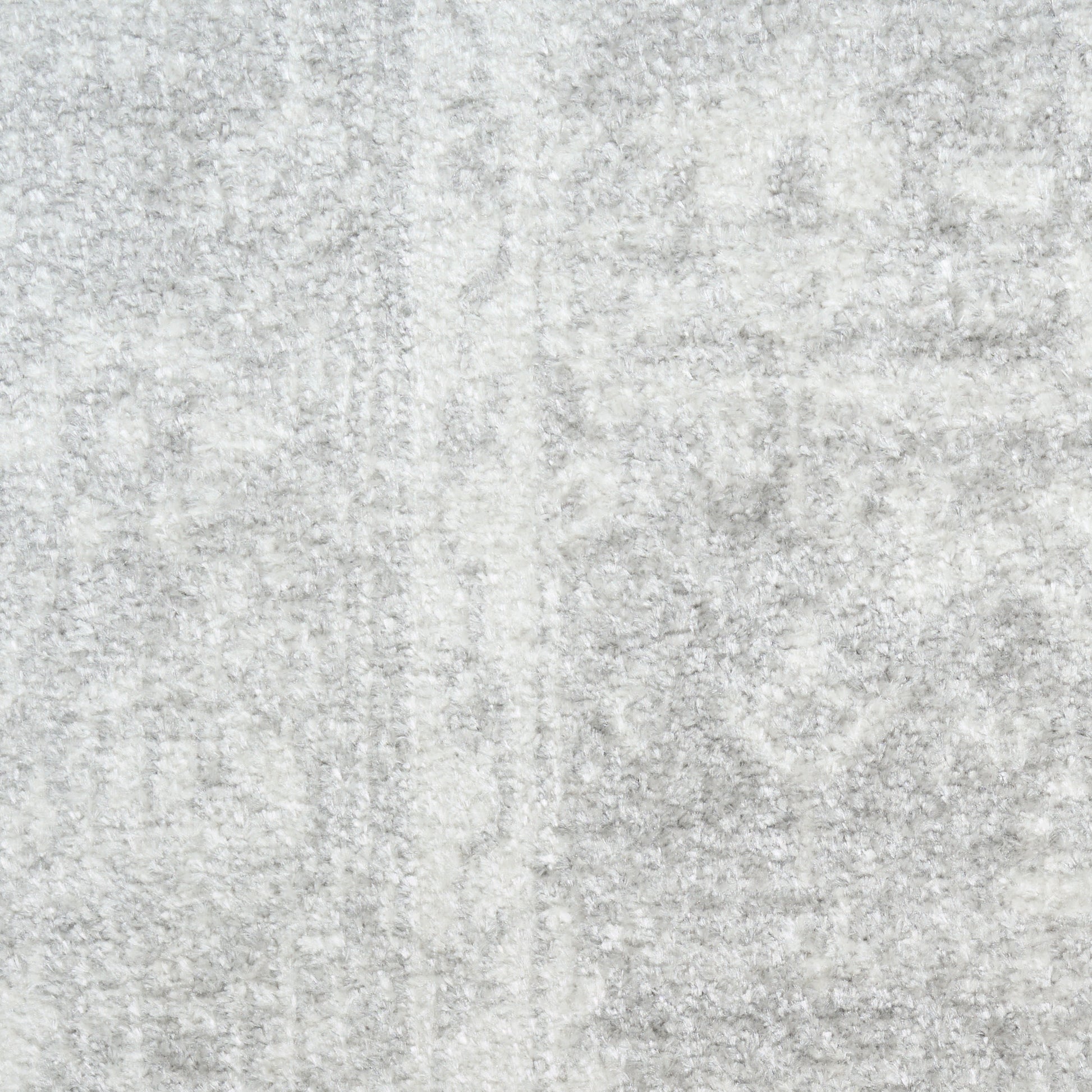 Light gray textured rug with a soft, plush pile; round, vintage-style rug, 8' diameter.