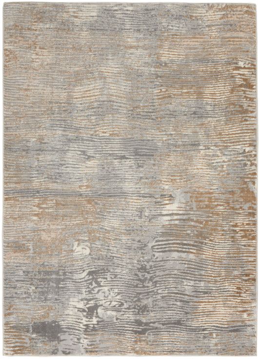 Rectangular area rug in muted beige, gray and taupe with abstract, wavy linear pattern.
