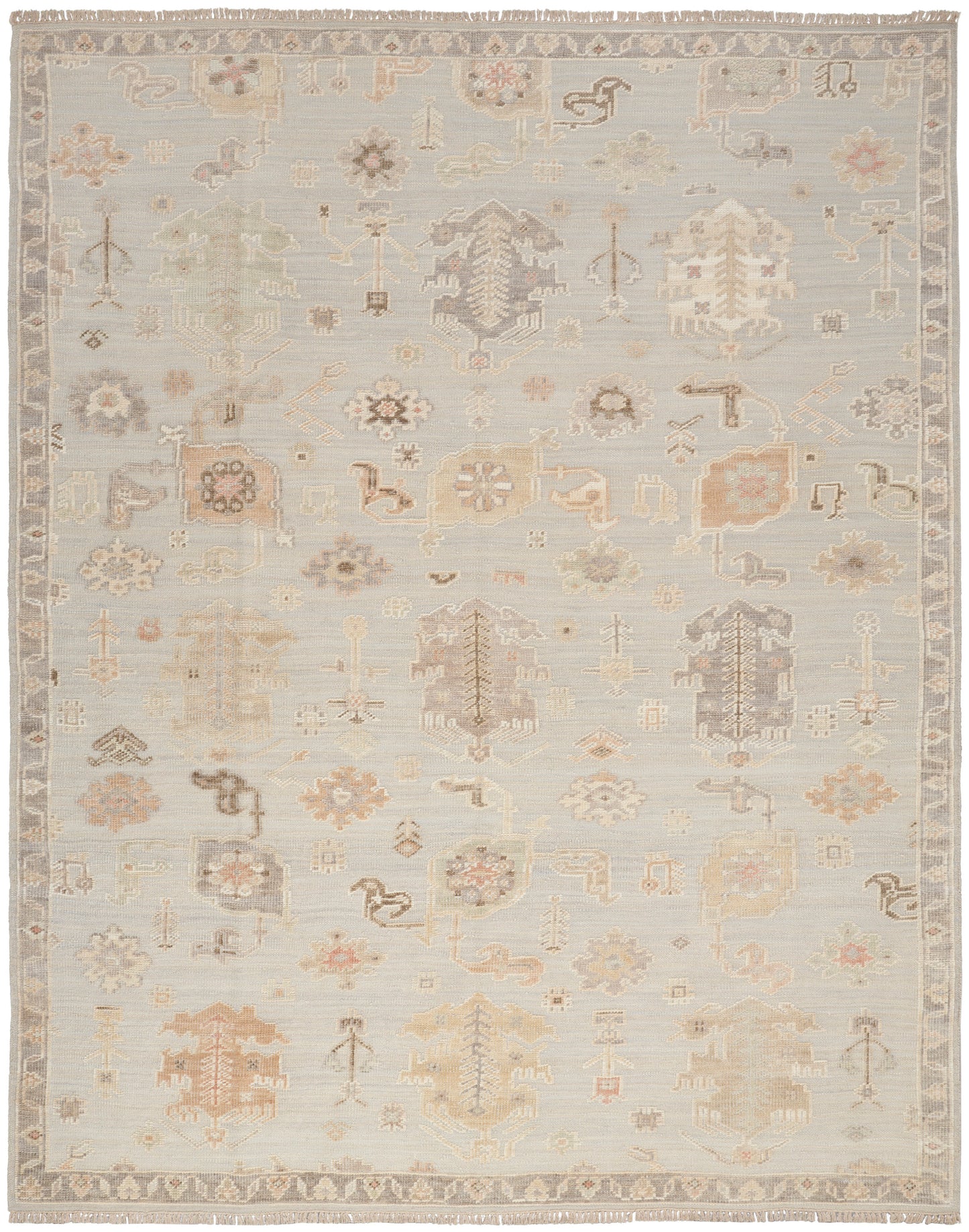 Distressed light blue-gray rug with ivory and beige geometric floral motifs and a classic border.