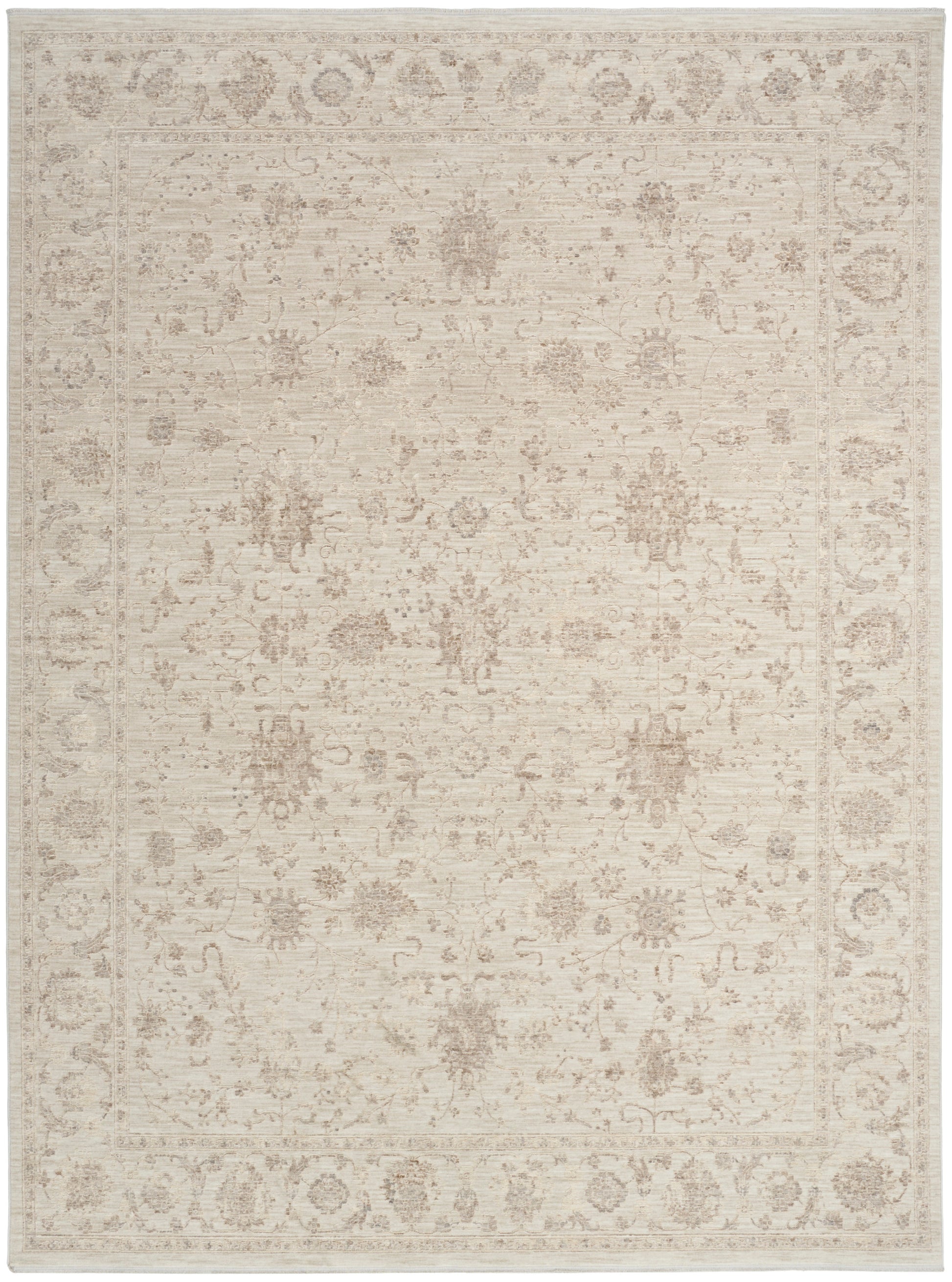 Beige vintage-style oriental rug with faded floral medallions and ornate border.