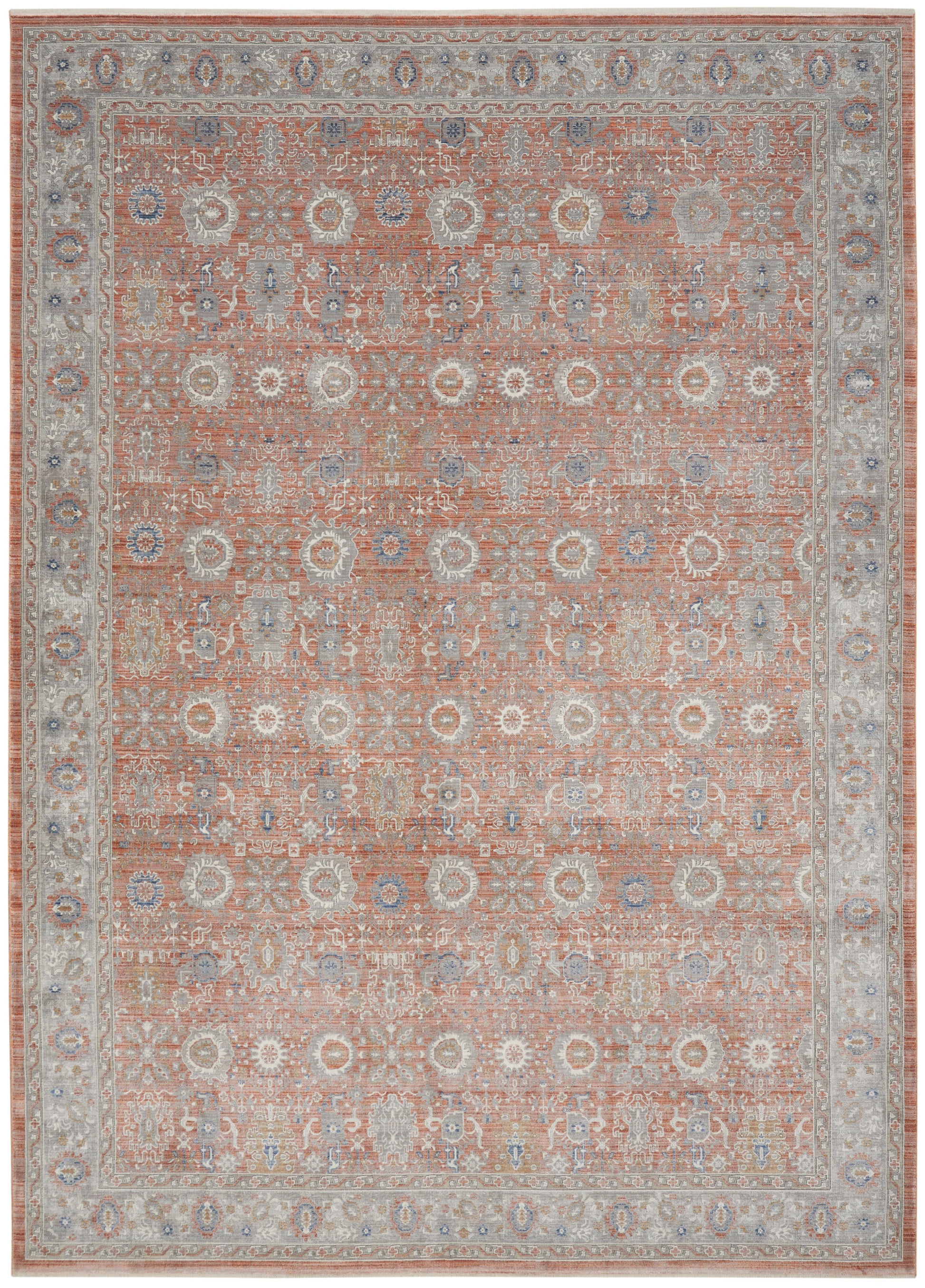 Rectangular oriental rug with peach field and ivory-blue floral medallions; pale gray-blue border in vintage Persian style.