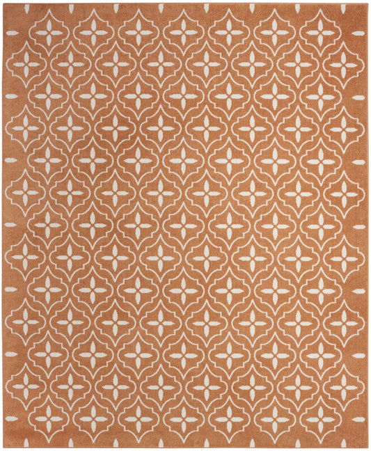 Terracotta rug with a white quatrefoil lattice pattern; woven flat-weave, rectangular indoor rug.