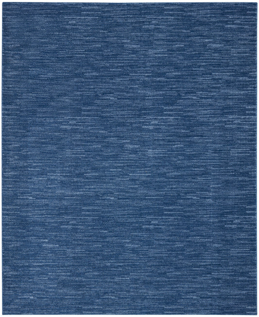 Blue textured outdoor rug with a subtle heather pattern; rectangular, modern woven style.
