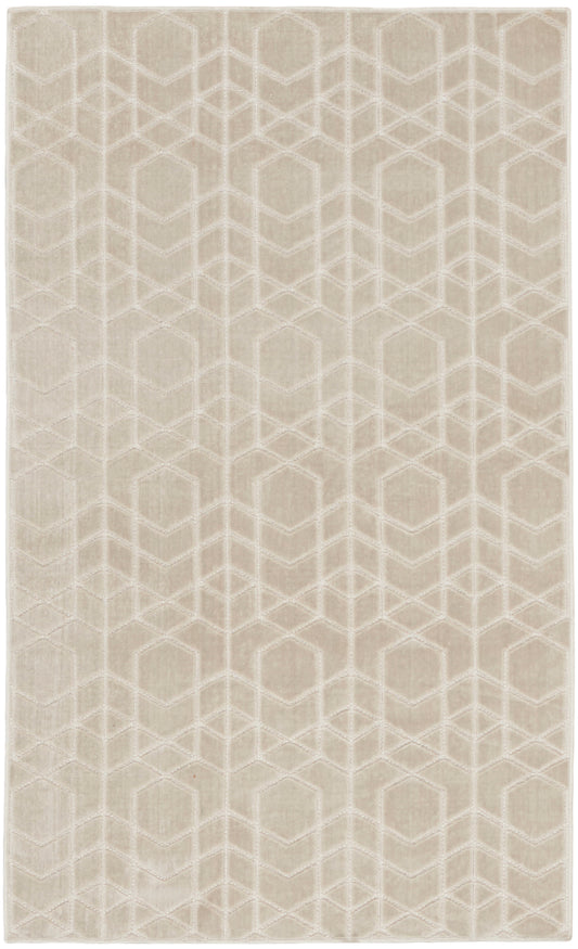 Beige rug with a subtle white geometric hexagon/cube motif and a soft textured surface.
