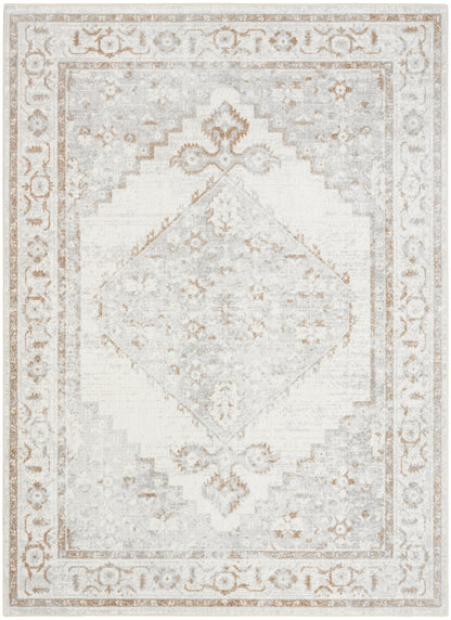 Soft ivory distressed oriental area rug with pale gray medallion center and ornate border; vintage look.
