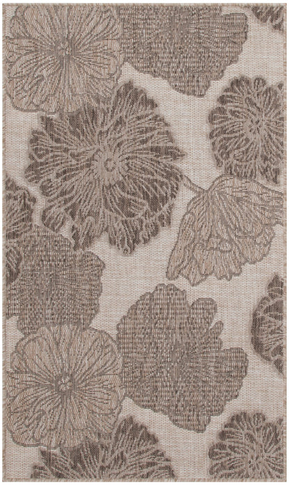 Beige rug with large brown floral print, woven texture, botanical-style pattern for living room decor.