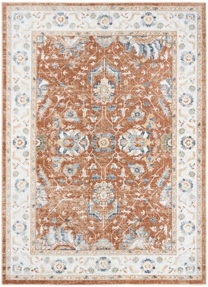 Rust-orange Persian-style rug with blue and ivory floral vines and an ivory border with blue blossoms.