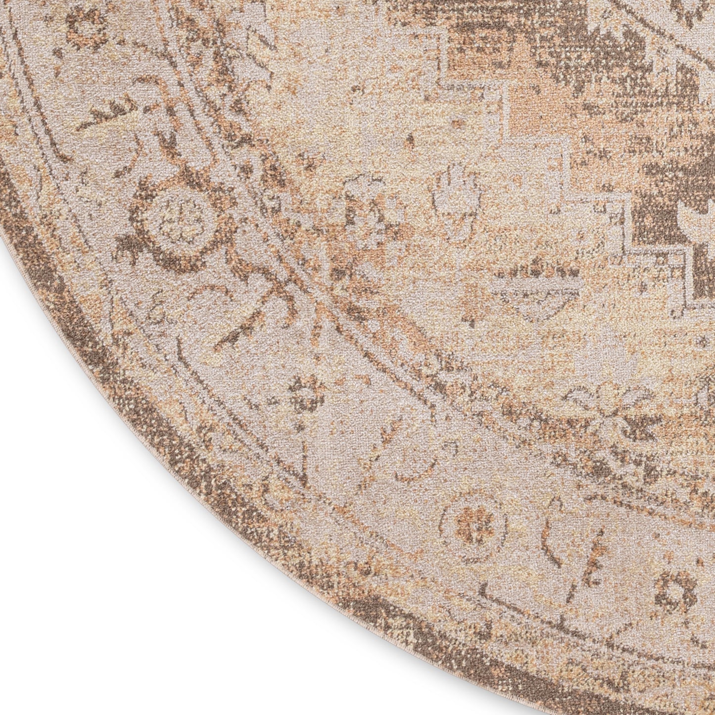 Round beige rug with distressed vintage oriental medallion pattern in tan and cream tones.