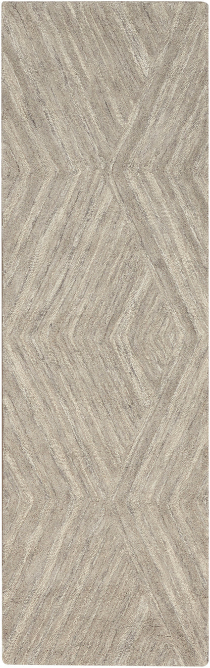 Beige textured runner rug with chevron-diamond geometric pattern in taupe and gray tones.